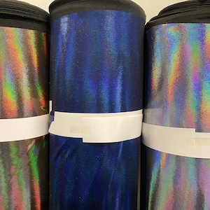 Oil slick hologram nylon spandex iridescent all over foil 4-way stretch 58/60” Sold by the YD. Ships worldwide from Los Angeles CA