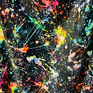New splatter paint design Black/Multicolor print on best quality of stretch velvet 4-way stretch 58/60” Sold by the YD. Ships worldwide