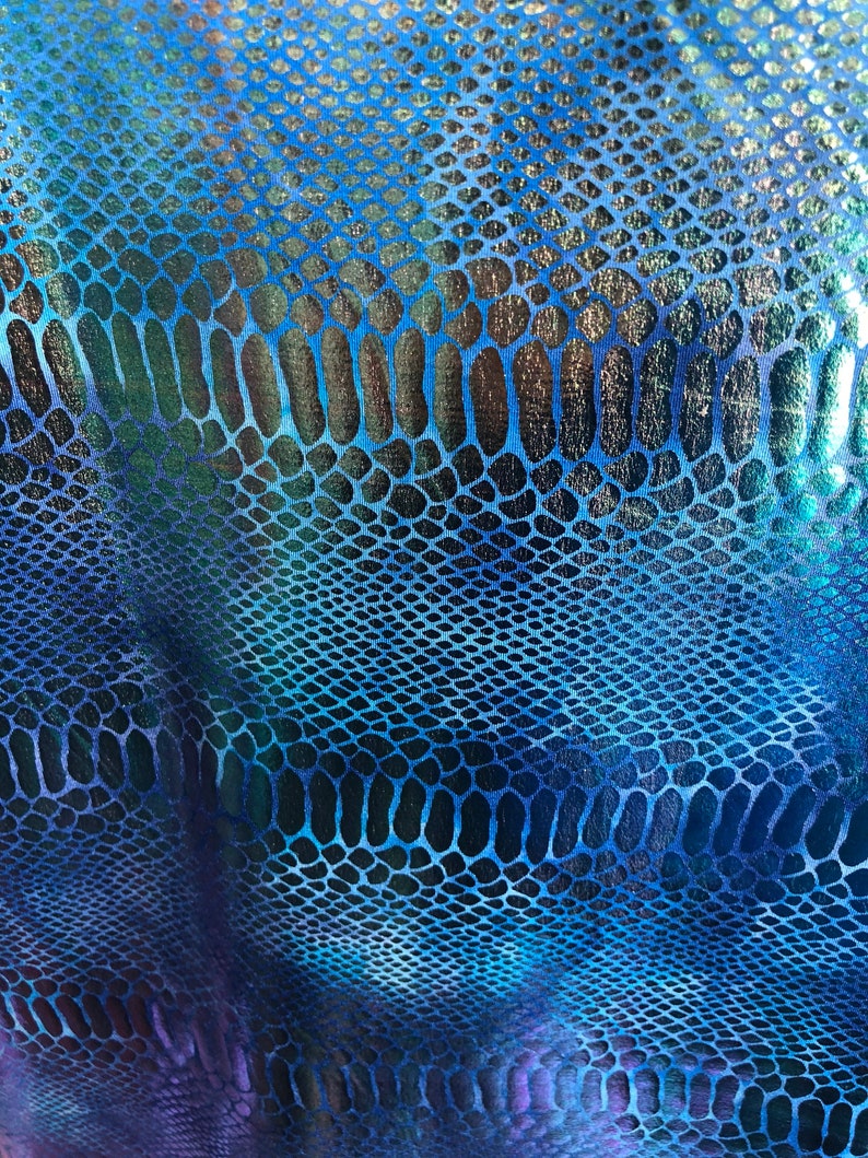 New iridescent metallic nylon spandex dragon design 4way stretch 5860 Sold by the YD Ships worldwide from Los Angeles California USA.
