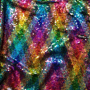 New rainbow sequins mermaid reversible sequins rainbow/silver on spandex base 58/60&quot; Sold by the YD. Ships Worldwide from Los Angeles CA USA