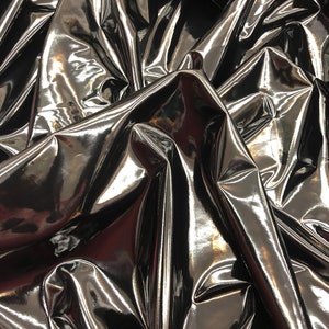 Shining black latex vinyl 4way stretch 58/60&quot; Sold by the YD. Ships worldwide from Los Angeles California USA.