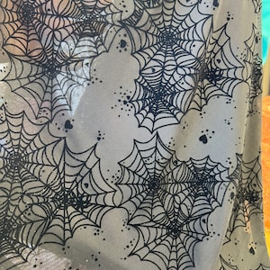 New Spider web design print on great quality of power mesh nylon spandex 4-way stretch 58/60” Sold by the YD. Ships Worldwide from Los  CA