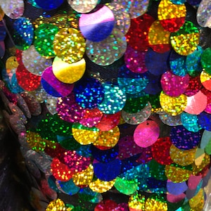New multicolor paillet sequins on stretch mesh 2 way vertical way only 58/60" Sold by the YD. Ships worldwide from Los Angeles California.