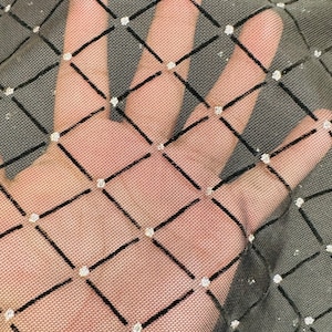 Diamond power mesh with flocking 4-way spandex 58/60” Sold by the YD.