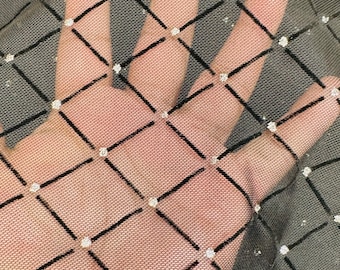 Diamond power mesh with flocking 4-way spandex 58/60” Sold by the YD.
