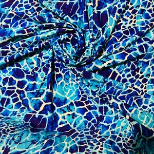 New abstract design Aqua blue color print on best quality of nylon spandex 4-way stretch 58/60”