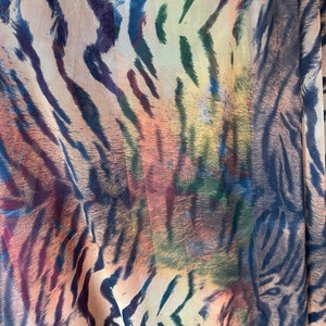Exotic Tiger design print on power mesh 4-way stretch 58/60” Sold by the YD. Ships Worldwide from Los Angeles California