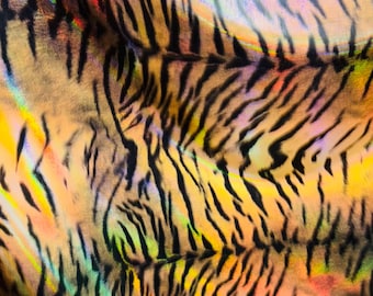 NEW Tiger design on Iridescent Oil Slick metallic hologram nylon spandex 4way stretch 58/60" Sold by the YD. Ships worldwide from Los Angele