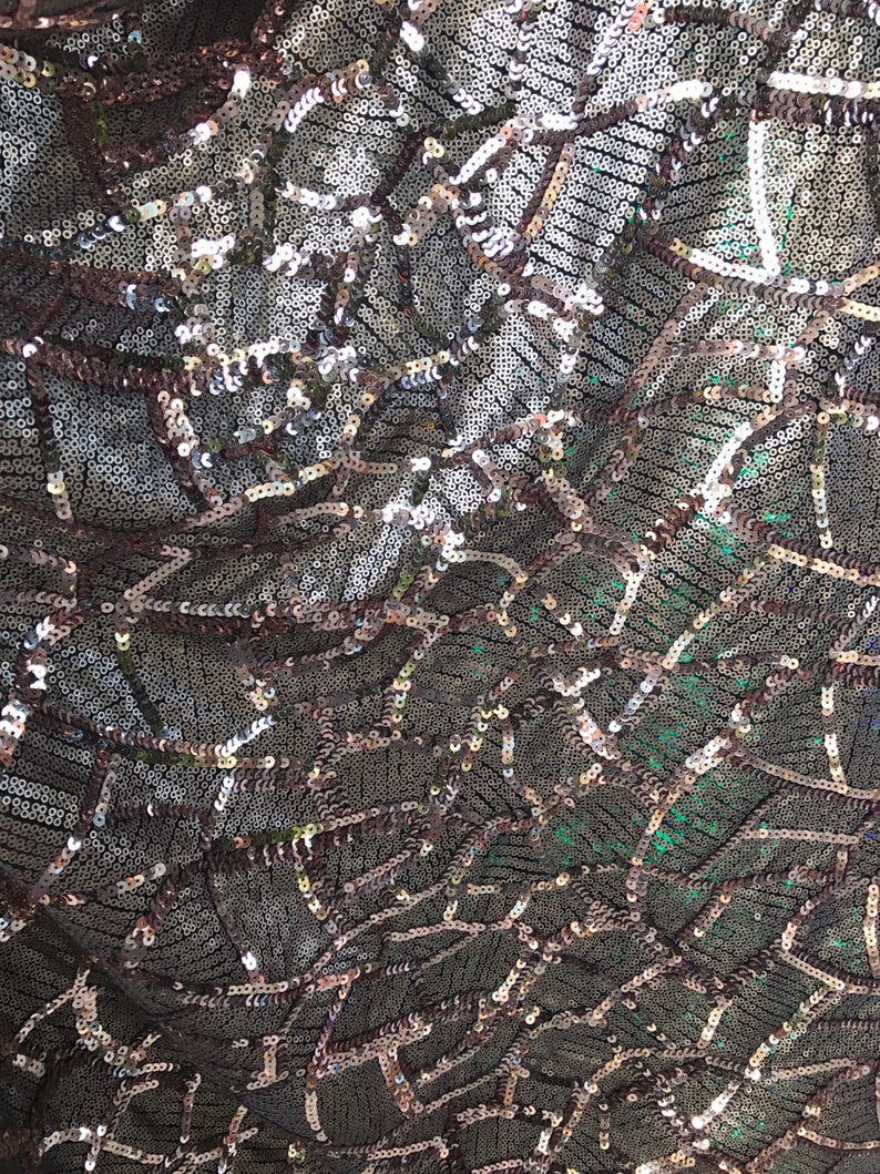 Spider design rose gold sequins 2-size all over on spandex mesh base 5556 Sold by the yd ships worldwide from Los Angeles California USA.