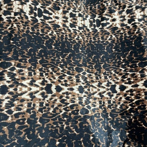 Black Jaguar design exotic animal print on great quality of stretch velvet 4-way stretch 58/60” Sold by the YD. Ships Worldwide