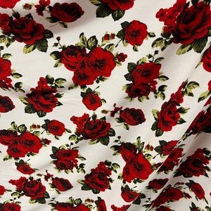 New Red Roses design print on poly spandex 4-way stretch 58/60” Sold by the YD. Ships worldwide from Los Angeles California USA.