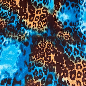 New exotic leopard design teal/brown and Rust/Beown print on poly spandex medium weight 4-way stretch 58/60” Sold by the YD.