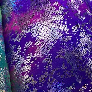 New tie dye Cobra design snake skin foil print on best quality of nylon spandex 4-way stretch 58/60” Sold by the YD. Ships Worldwide