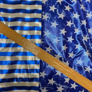 New metallic nylon spandex stripes blue/silver and stars design blue white spandex with foggy foil 4-way stretch 58/60” Sold by the YD.