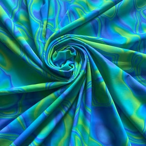 Lava modern abstract design print on best quality of Nylon spandex 4-way stretch 58/60” Sold by the YD.