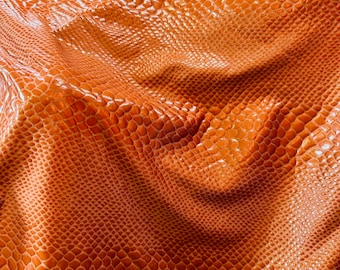 New Anaconda iridescent clear foil on poly spandex 4-way stretch medium weight 58/60” Sold by the YD. Ships Worldwide from Los Angeles cali