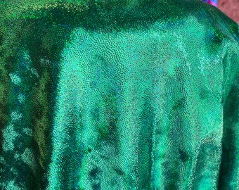 New oil slick iridescent foggy foil on stretch velvet 4-way stretch 58/60” Sold by the YD. Ships worldwide from Los Angeles California USA.