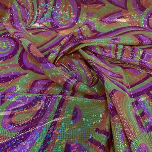 New Modern Paisley Design Hologram Metallic Nylon Spandex 4-Way Stretch 58/60" Sold By The Yd. Ships Worldwide From Los Angeles California.