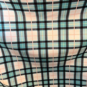 New modern plaid design Tiffany/blush pink print on great quality of nylon spandex 4-way stretch 58/60”  Sold by the YD.