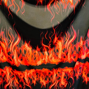 Flames design Black/Fire print on great quality of Poly spandex 4-way stretch 58/60” Sold by the YD. Ships Worldwide from Los Angeles