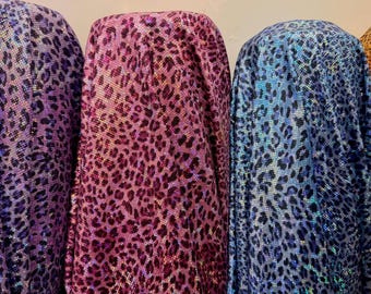 Cheetah hologram design New shattered glass hologram  metallic nylon spandex 4-way stretch 58/60” Sold by the YD. Ships worldwide from LA CA