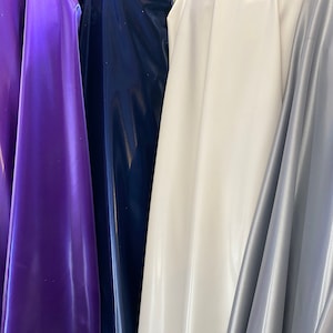 New Iridescent reflectiveTPU vinyl coated 4-way stretch poly spandex 58/60” Sold by the YD. Ships worldwide from Los Angeles California USA.