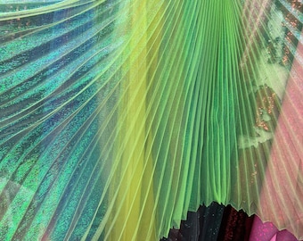 Sunburst pleated fabrics iridescent metallic organza 108” length by 56” width Sold by the PC ships worldwide from Los Angeles California USA