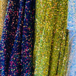 New stretch velvet with luxury sequins all over 5mm shining sequins 2-way stretch 58/60” Sold by the YD. Ships worldwide from Los Angeles CA