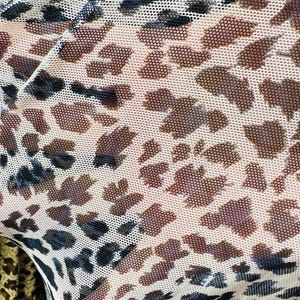 New Cheetah design print on power mesh nylon spandex 4-way stretch 58/60” Sold by the YD. Ships worldwide from Los Ángeles California USA.