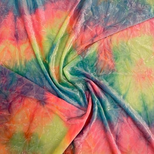 Rainbow multi pastel tie dye Luxury crushed velvet 4-way stretch 58-69” Sold by the YD. Ships Worldwide from Los Angeles California USA.