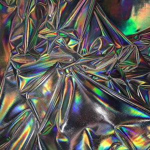 Beatiful Iridescent silver foil on nylon Spandex 4way stretch 58/60" Sold by the YD. Ships worldwide from Los Angeles California USA