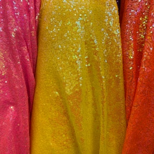 Luxury mini glitz sequins neon iridescent colors on stretch mesh 2-way 58/60” Sold by the YD. Ships worldwide from Los Angeles California US