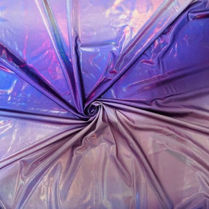 New Ombré design all over foil two tone hologram foil 4way stretch 58/60” Sold by the YD. Ships worldwide from Los Angeles CA USA.