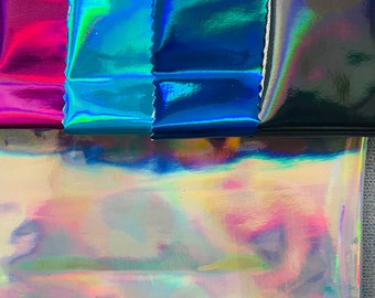 Ultra Iridescent holographic super shiny vinyl 4-way stretch 58/60” Sold by the YD. Apparel Accessories costume fashion. Ships Worldwide
