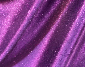New Selana design poly spandex with glitter eggplant/purple 4way stretch 58/60&quot; Sold by the YD. Ships worldwide from Los Angeles CA USA.