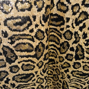 Exotic Leopard sequins design embroidered on stretch mesh 4-way 55/57” High quality fabrics by AlexLAFabrics