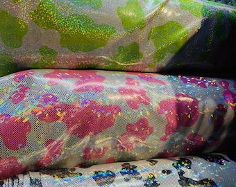 Cow Exotic design on metallic hologram nylon spandex 4-way stretch 58/60”