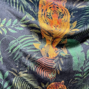 Tiger design print on great quality of stretch velvet 4-way stretch 58/60” Sold by the YD. Ships Worldwide from Los Angeles California