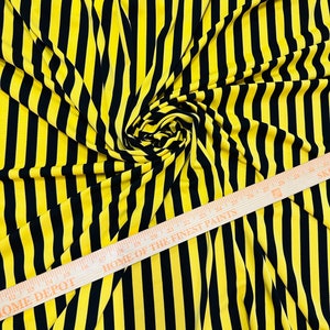 Stripes design print on poly spandex 4way stretch 58/60” sold by the yd. Ships worldwide from Los Angeles California USA.