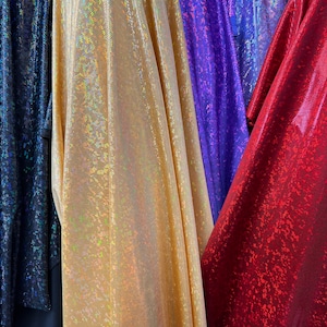 Shattered glass hologram metallic nylon spandex 4-way stretch 58/60” Sold by the YD. Ships Worldwide from Los Ángeles California USA.