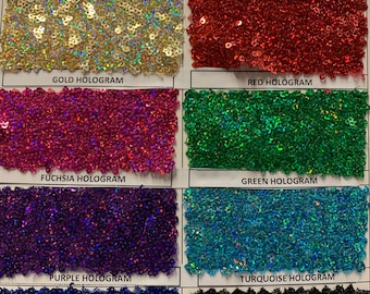 May include: A color chart of different sequin fabrics. The chart includes white, silver, gold, red, fuchsia, green, purple, turquoise, royal blue, and black sequins.