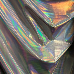 NEW Iridescent all over foil on nylon spandex 4way stretch 58/60&quot; Shining Iridescent foil white/silver Sold by the YD. Ships worldwide.