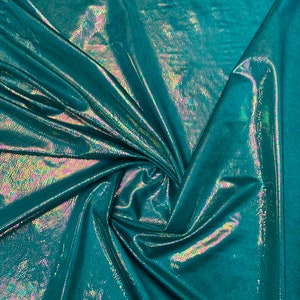 Iridescent reptile rainbow holo crystal snake nylon spandex 4way stretch 58/60&quot; Sold by the YD. Ships worldwide from Los Angeles California.