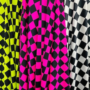May include: Three fabric swatches with a checkered pattern. The swatches are black and neon green, black and pink, and black and white.