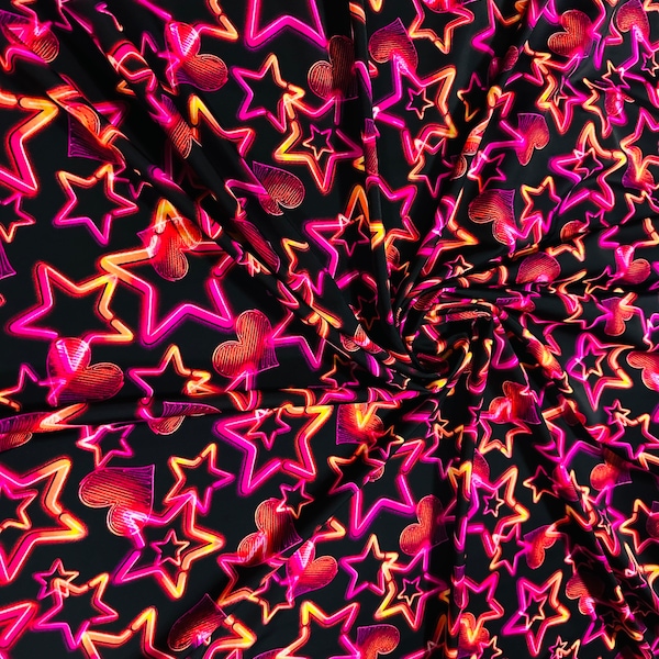 Stars design Black/Pink/Orange luxury design it glows in the dark with black light 4-way stretch nylon spandex 58/60” Sold by the YD.