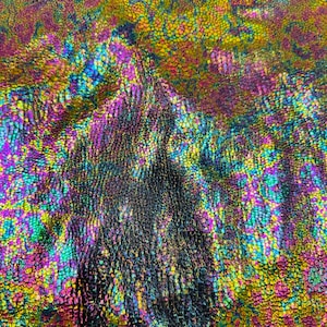 Iridescent snake skin cobra design hologram metallic nylon spandex 4-way stretch 58/60” Sold by the YD.