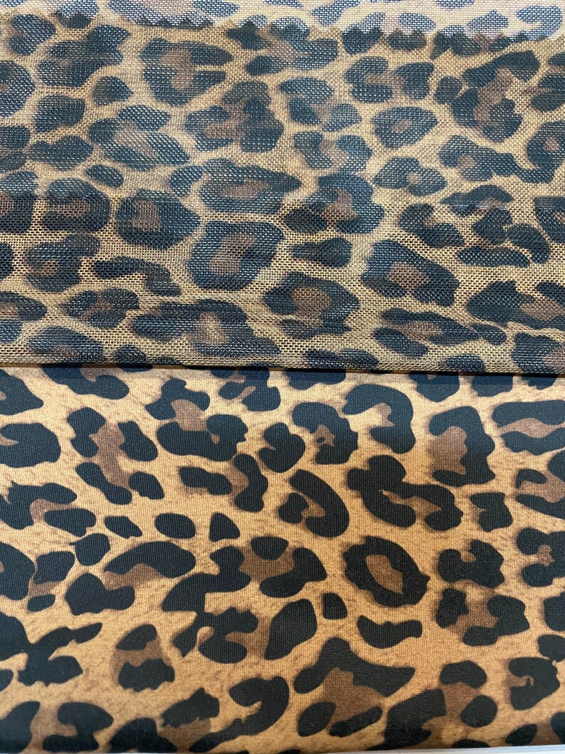 May include: Two pieces of fabric with a leopard print pattern. The top piece is a sheer mesh fabric and the bottom piece is a solid fabric.