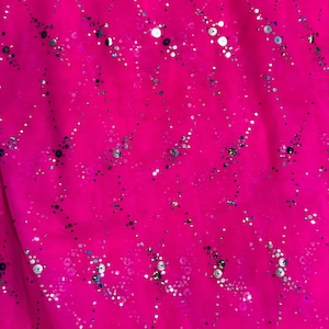 Celestial design hologram sequins on power mesh nylon spandex 4-way stretch 58/60” Sold by the YD. Ships worldwide from LA