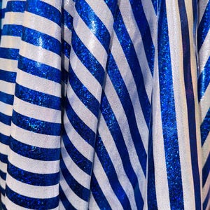 Stripe design nylon spandex 4way Hologram metallic foil Blue/Silver  58/60&quot; sold by the Yd. Ships worldwide from Los Angeles California USA.