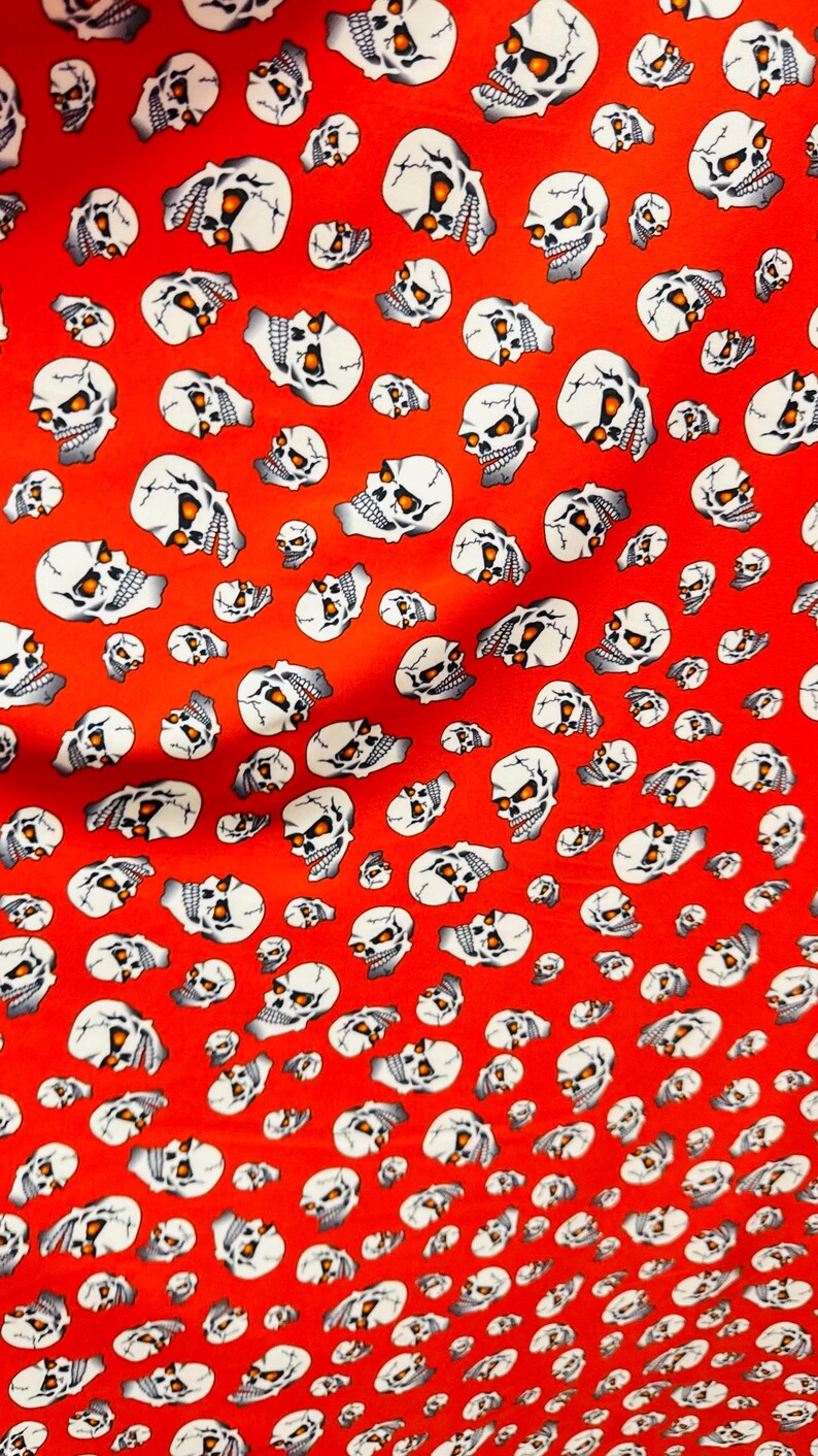Terminator Skull Design on nylon spandex 4-Way stretch 58/60” Sold by the Yd. Ships worldwide From Los Angeles California USA. Red/White